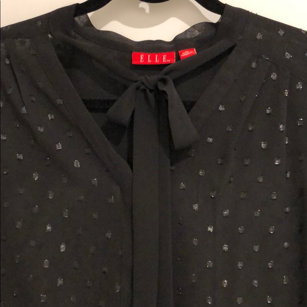Like NEW. Sheer black blouse with metallic detail